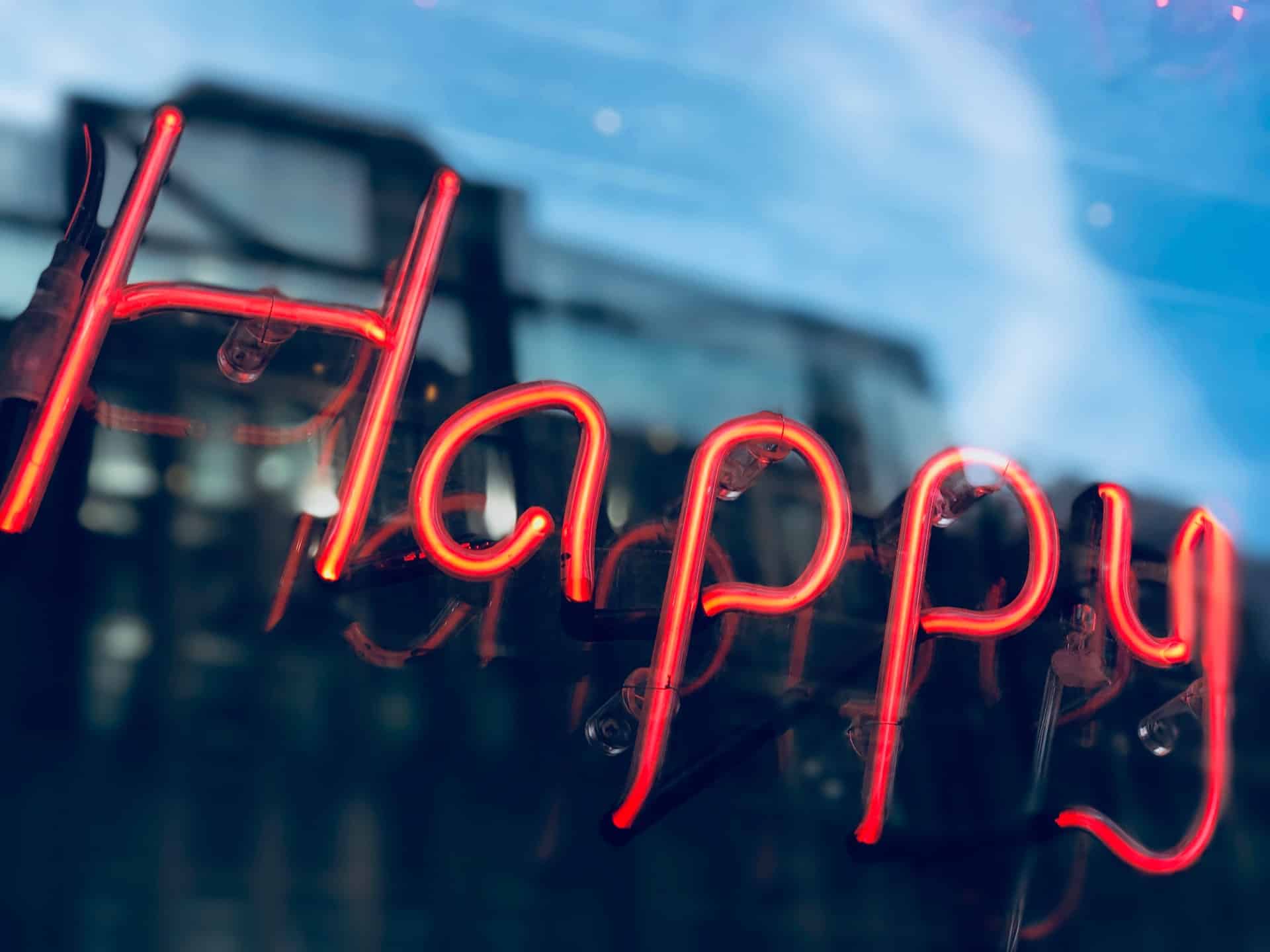 luminescent happy sign in window