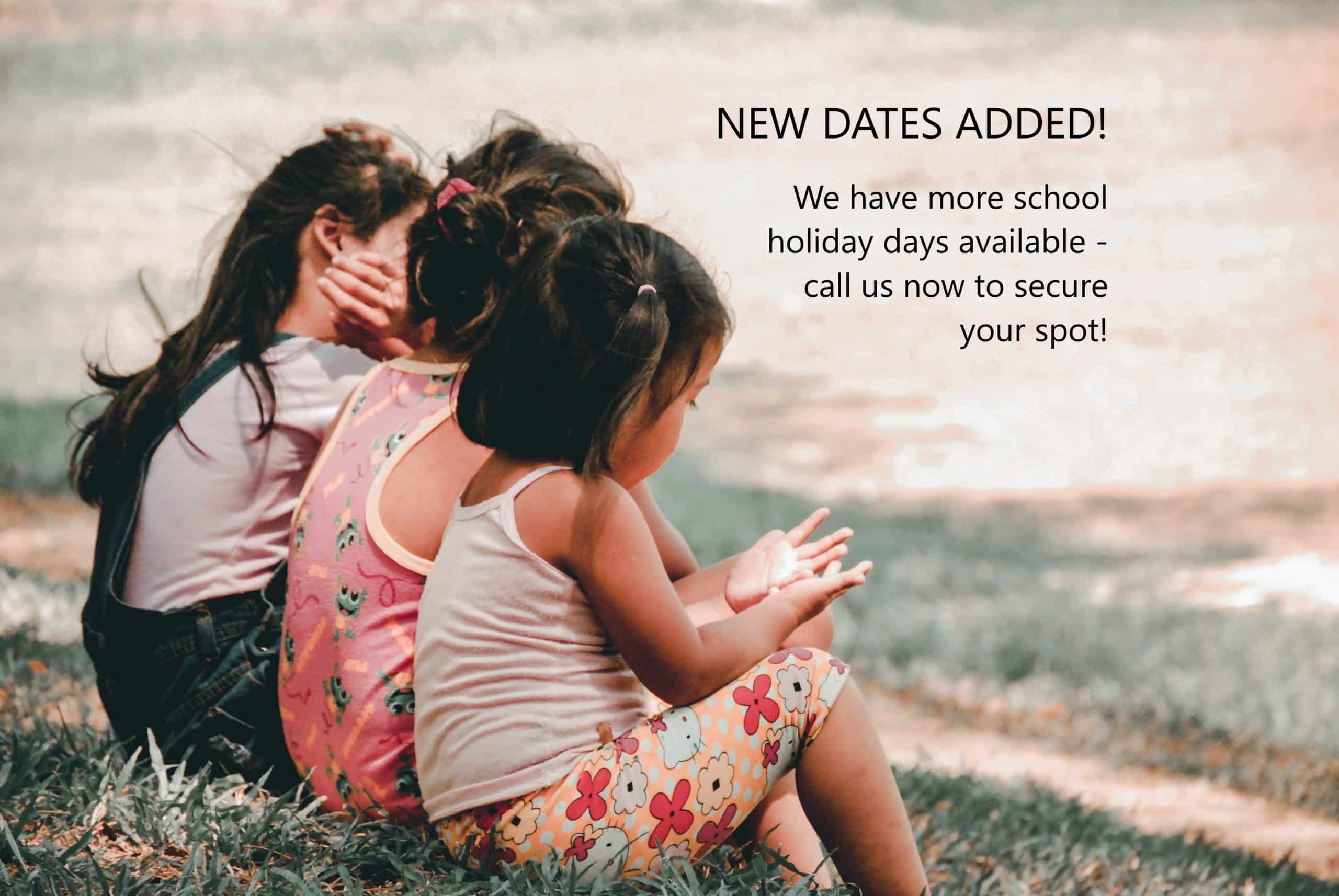 children sitting on hill with overlay text for school holiday appointments