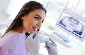 Young Woman Having Her Dental Checkup — Dentist In Gosford, NSW
