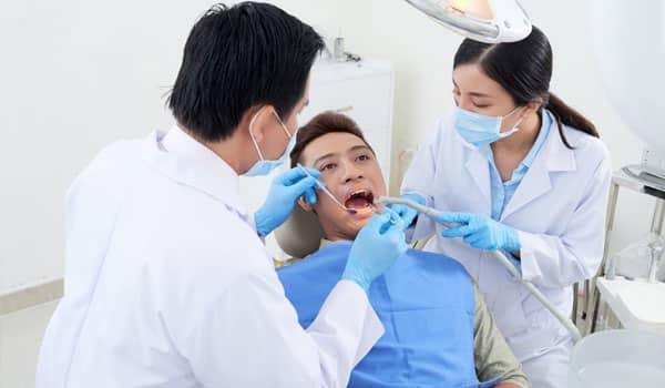 man at dentist having treatment