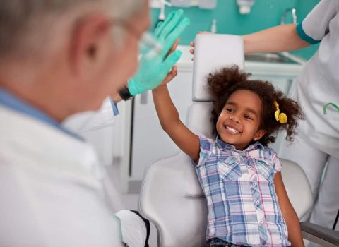 Lovely Kid In Dental Chair With Dentist