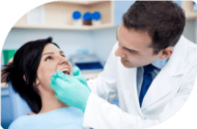 Dentist Checking Up Woman's Teeth — Dentist In Gosford, NSW