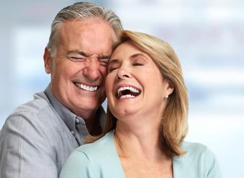 Happy Senior Couple with white teeth