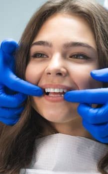 Young Woman Having Dental Checkup — Dentist In Gosford, NSW