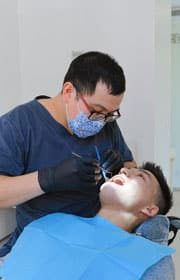 dentist removing teeth